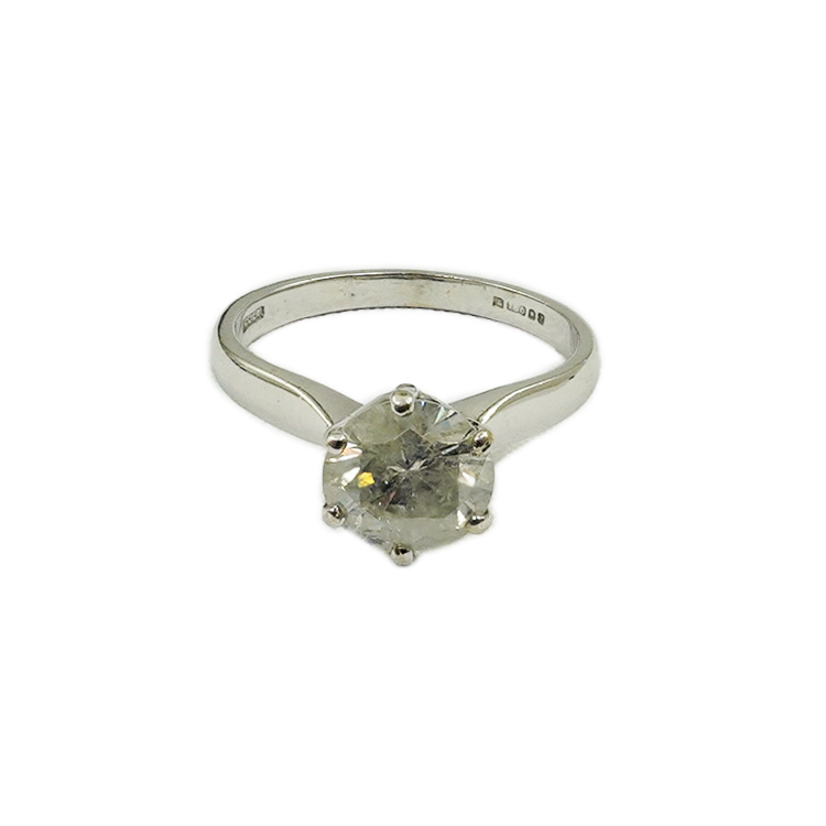 A modern 18ct white gold and solitaire diamond set ring